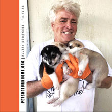 PETS RETURN HOME Mark Happe with Pack of Puppies