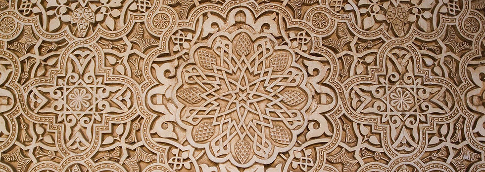 Ornate geometric pattern with intricate floral and star motifs in beige and brown tones, creating an elegant and symmetrical design.