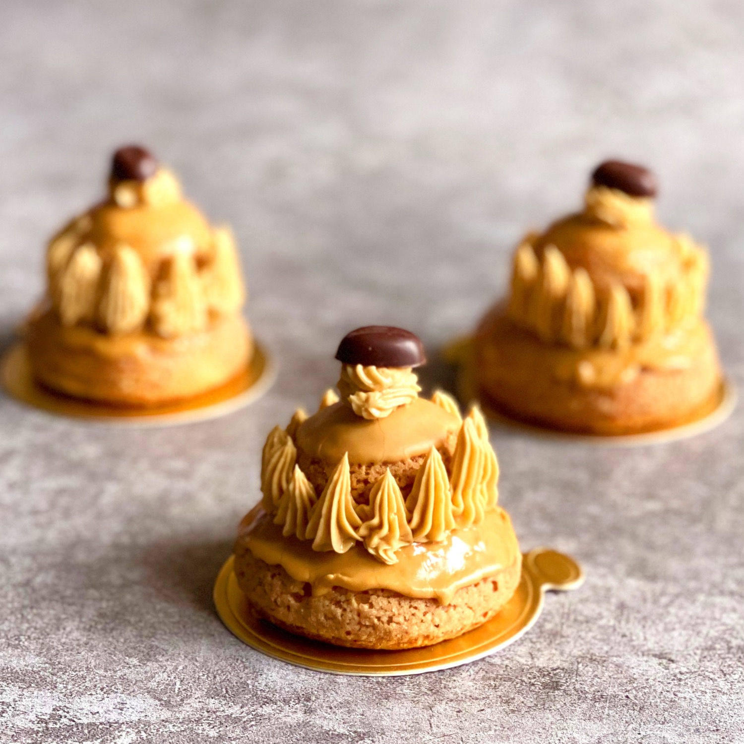 French Religieuse pastries with coffee cream filling and caramel glaze – artisanal patisserie in Hong Kong
