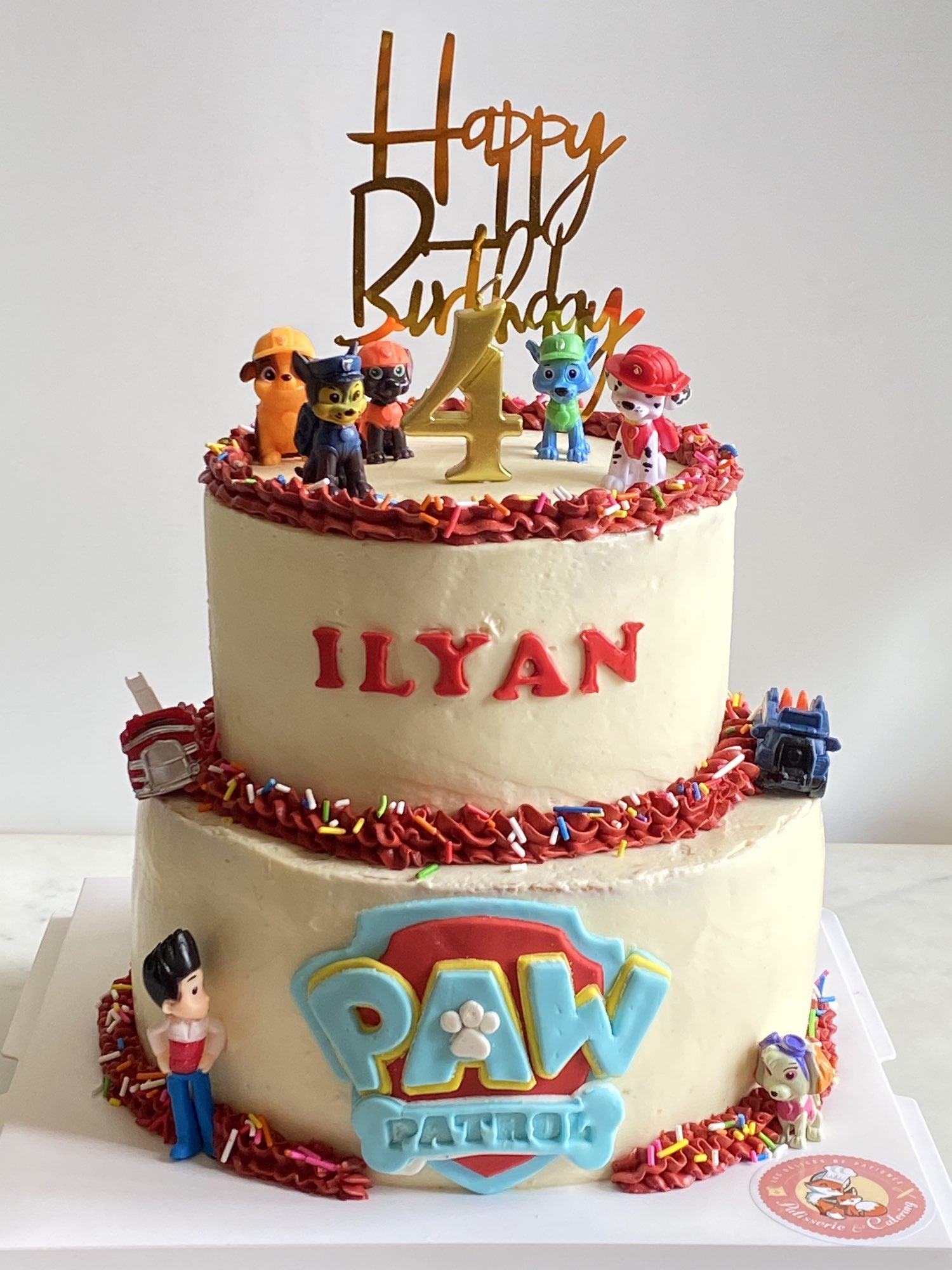 Two-tier Paw Patrol birthday cake Hong Kong – personalized with name Ilyan and figurines