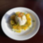 Buffalo mozzarella on green pesto and Stracciatela cream