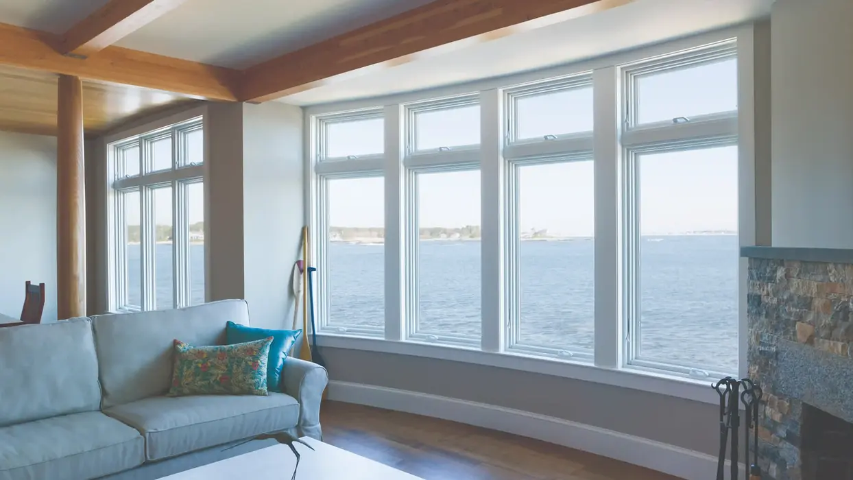 Ocean view living room with large windows