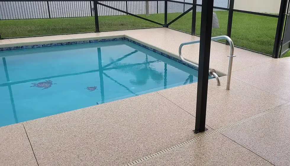 Residential pool with turtle mosaic and new deck flooring