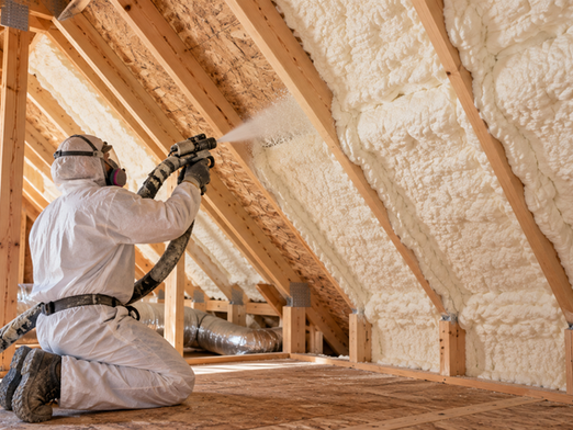 Professional spray foam insulation installation in a home's attic