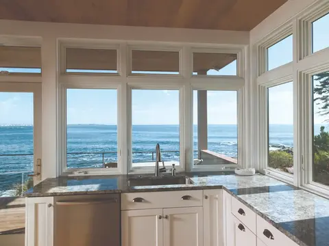 Ocean view kitchen with large windows