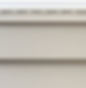 Close-up view of light beige vinyl siding