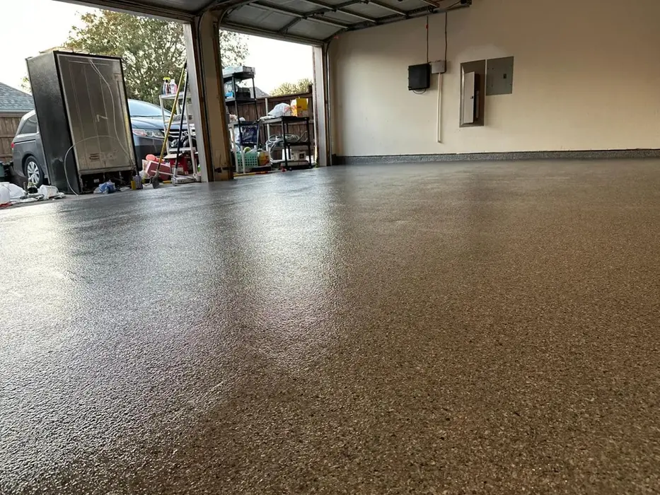 New garage floor with epoxy coating, clean and shiny