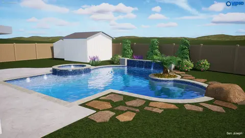 Modern backyard pool design with spa and waterfall feature