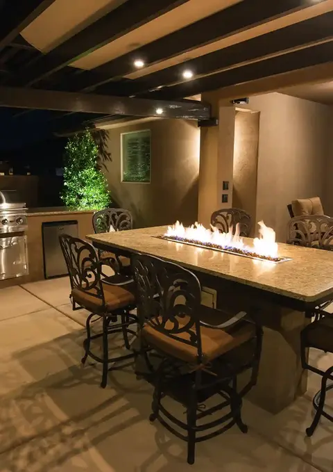 Outdoor kitchen and fire pit table