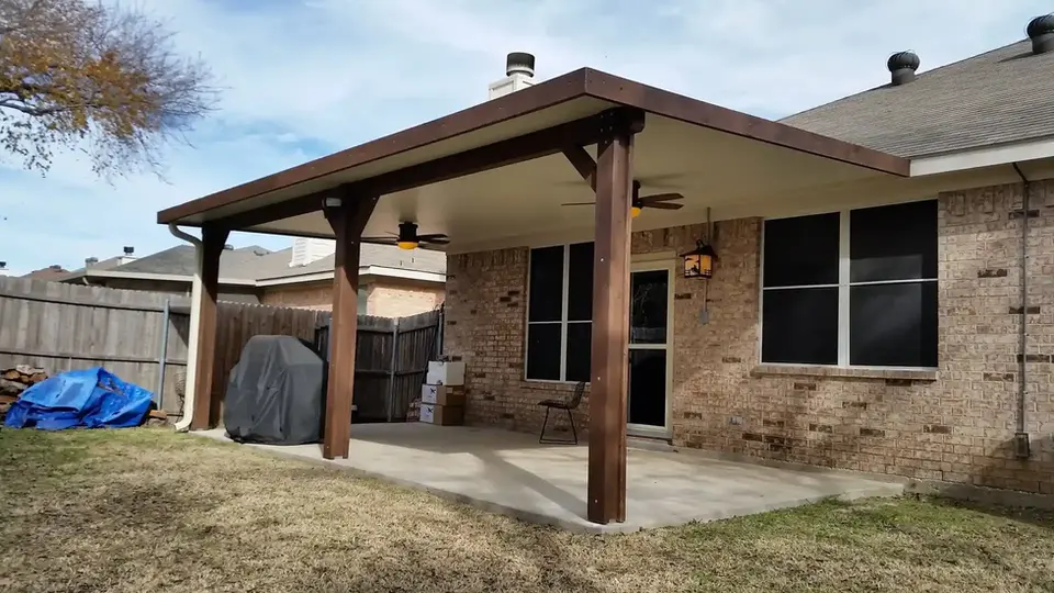 Covered patio with ceiling fan, providing shade and outdoor living space