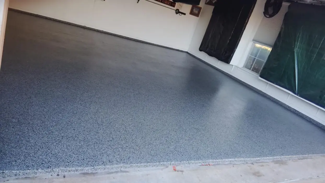 Newly installed gray garage floor coating: sleek and durable finish
