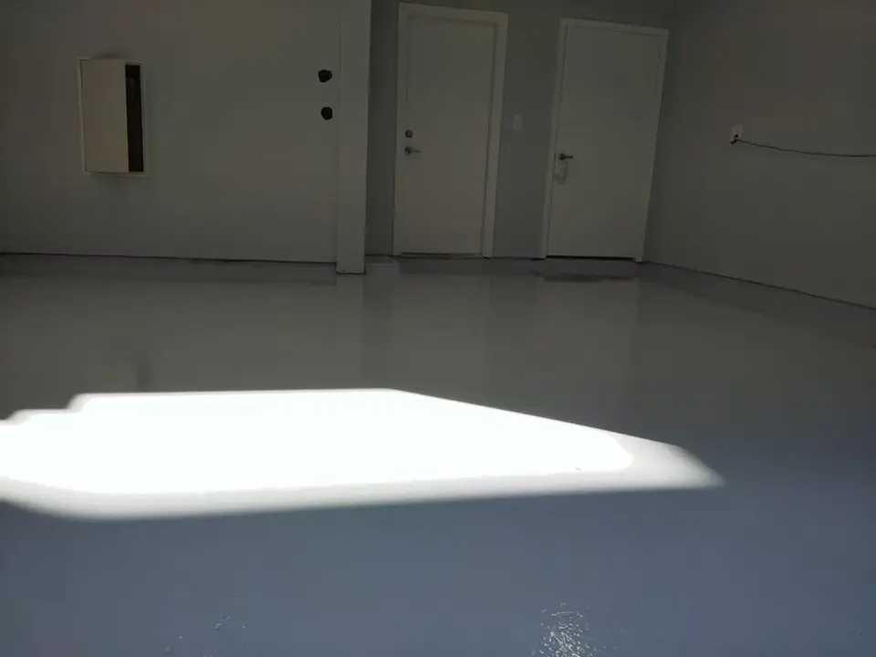 Newly installed epoxy garage floor, clean and bright