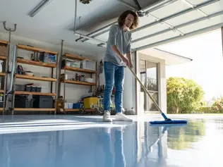 Cleaning a garage floor coating in DFW home garage