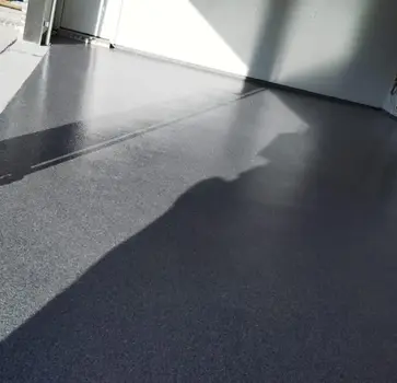 Sleek gray epoxy garage floor coating