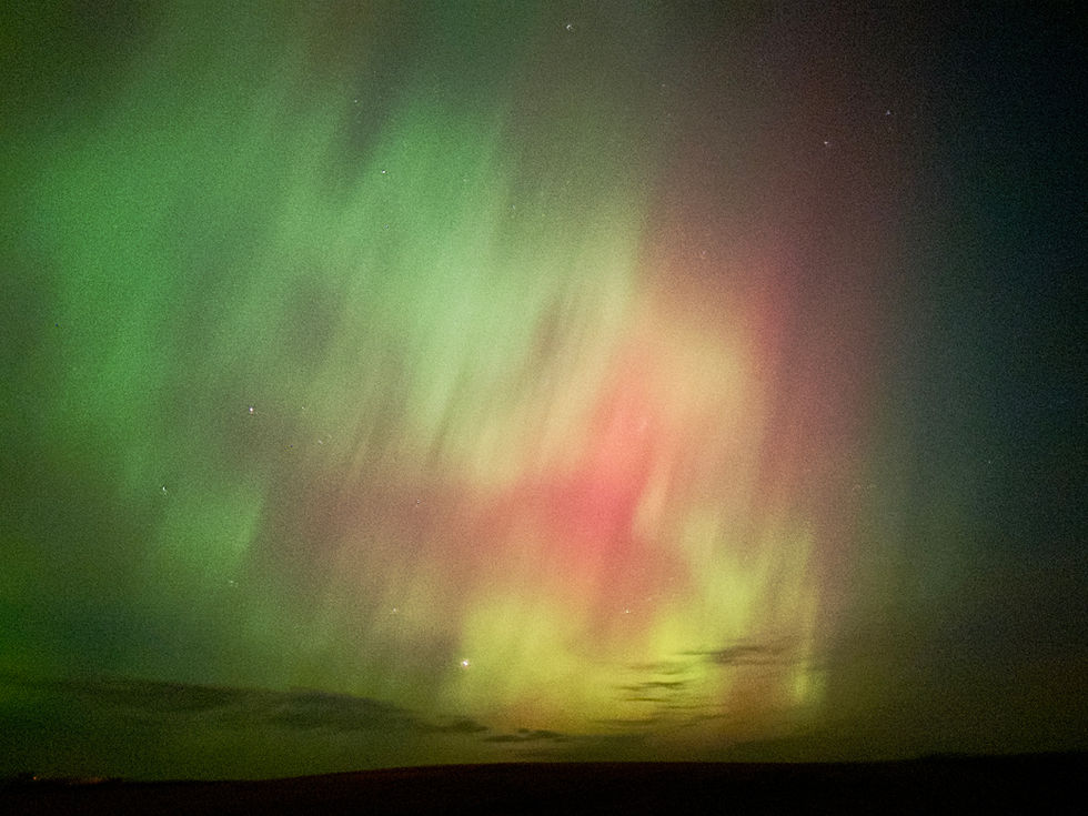 Aurora with pink yellow and green