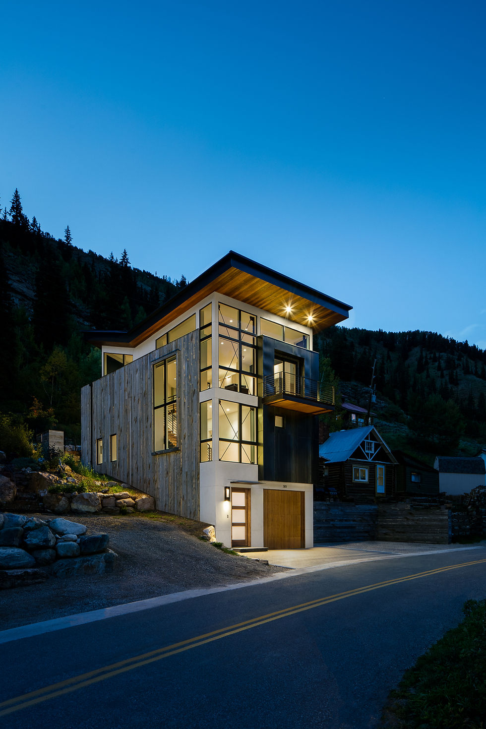 Mountain modern wood and steel custom home design