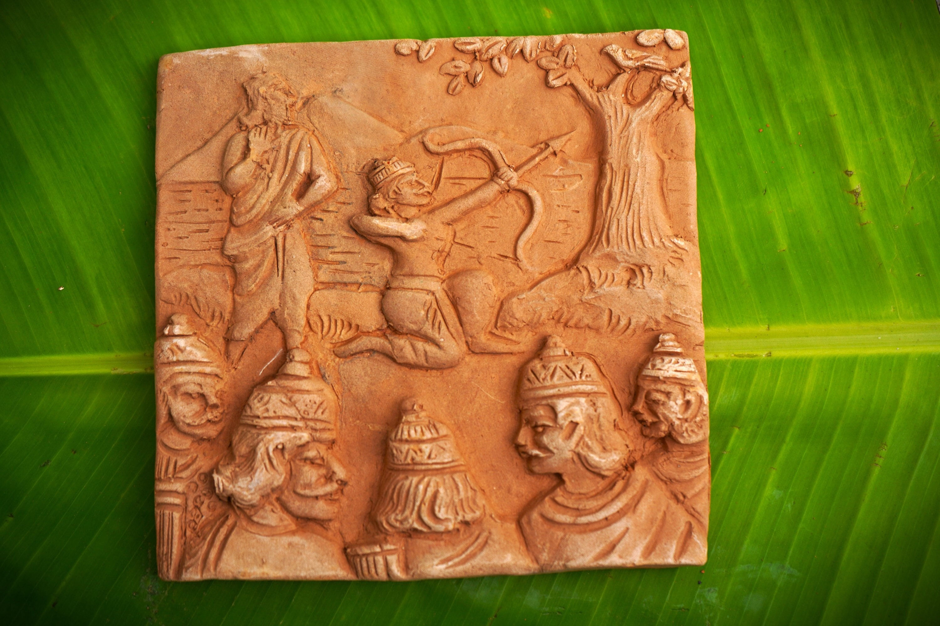 Handmade terracotta tiles depicting scenes of Mahabharat -set of 4