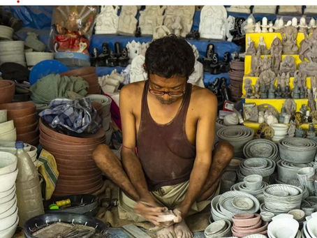 An Indian artisan making monolithic stone sculptures