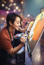 Guests painting together during a paint and sip event in Yuma, Arizona