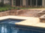 Pool deck and retaining wall