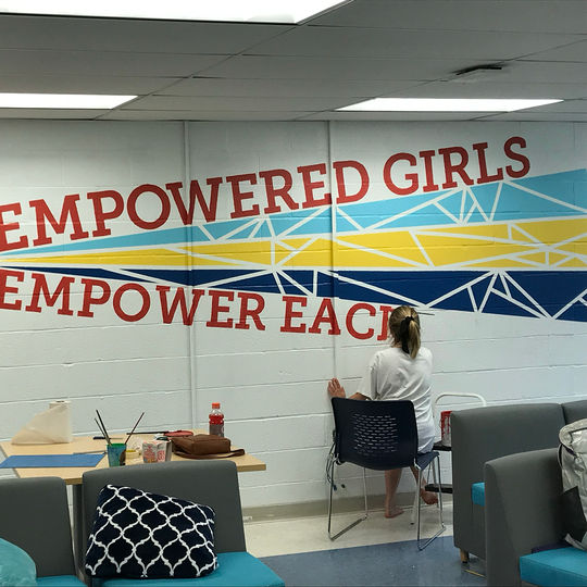 "empowered girls empower each other" mural by lila hathaway