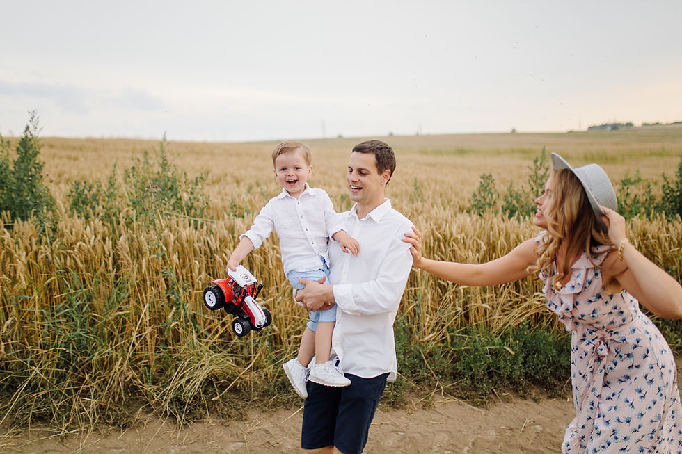 happy-young-family-dad-mom-little-son-looks-happy-park.jpg
