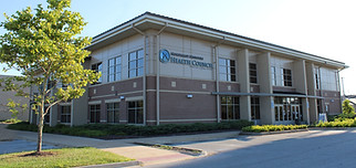 Exterior view of the building with American Academy of Pediatrics sign.