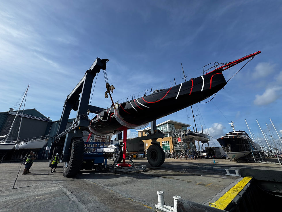embrace the challenge imoca yacht is lifted out of the water