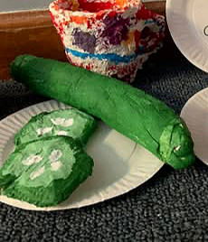 cucumber toilet paper sculpture