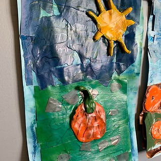 fall pumpkin patch art displayed on wall of a school