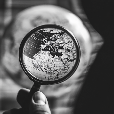 zs.2001._a_magnifying_glass_looking_at_a_black_and_white_modern_f87418a7-1678-4b02-b374-cf