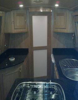 KITCHEN OPAQUE DIVIDER DOOR & CUPBOARDS - OAK.jpg