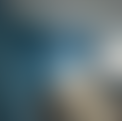 Professional bedroom painting service, teal blue feature wall, South West UK.