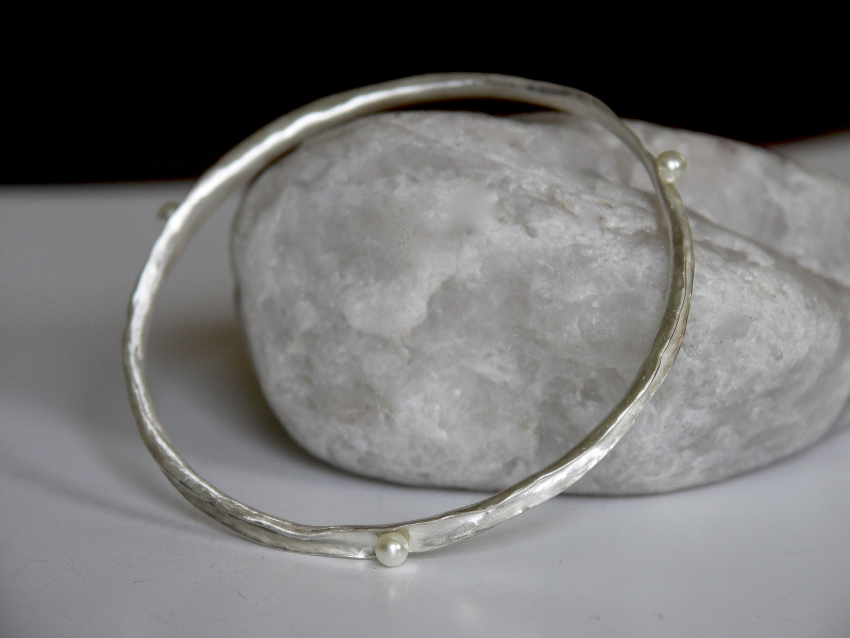Anti-clastic bangle set with Swarovski® crystal pearls