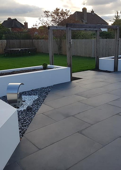 Create a picturesque oasis with our expert landscaping services. Enhance your outdoor space with a stunning sandstone walkway