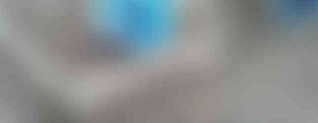 Preschool child playing in mud