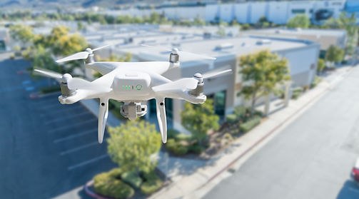 drone inspecting commercial building roof