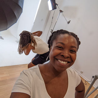 assistant photographer taking images