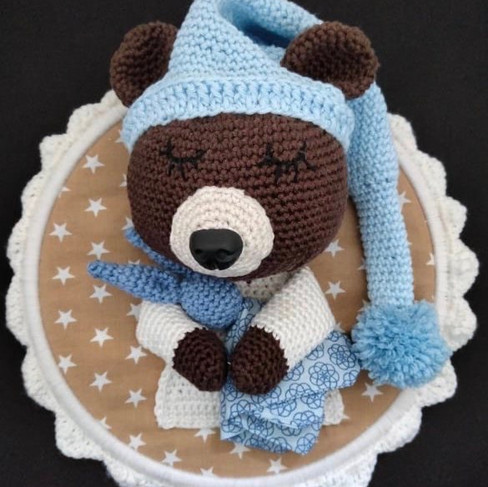 Trophée ourson endormi avec son doudou