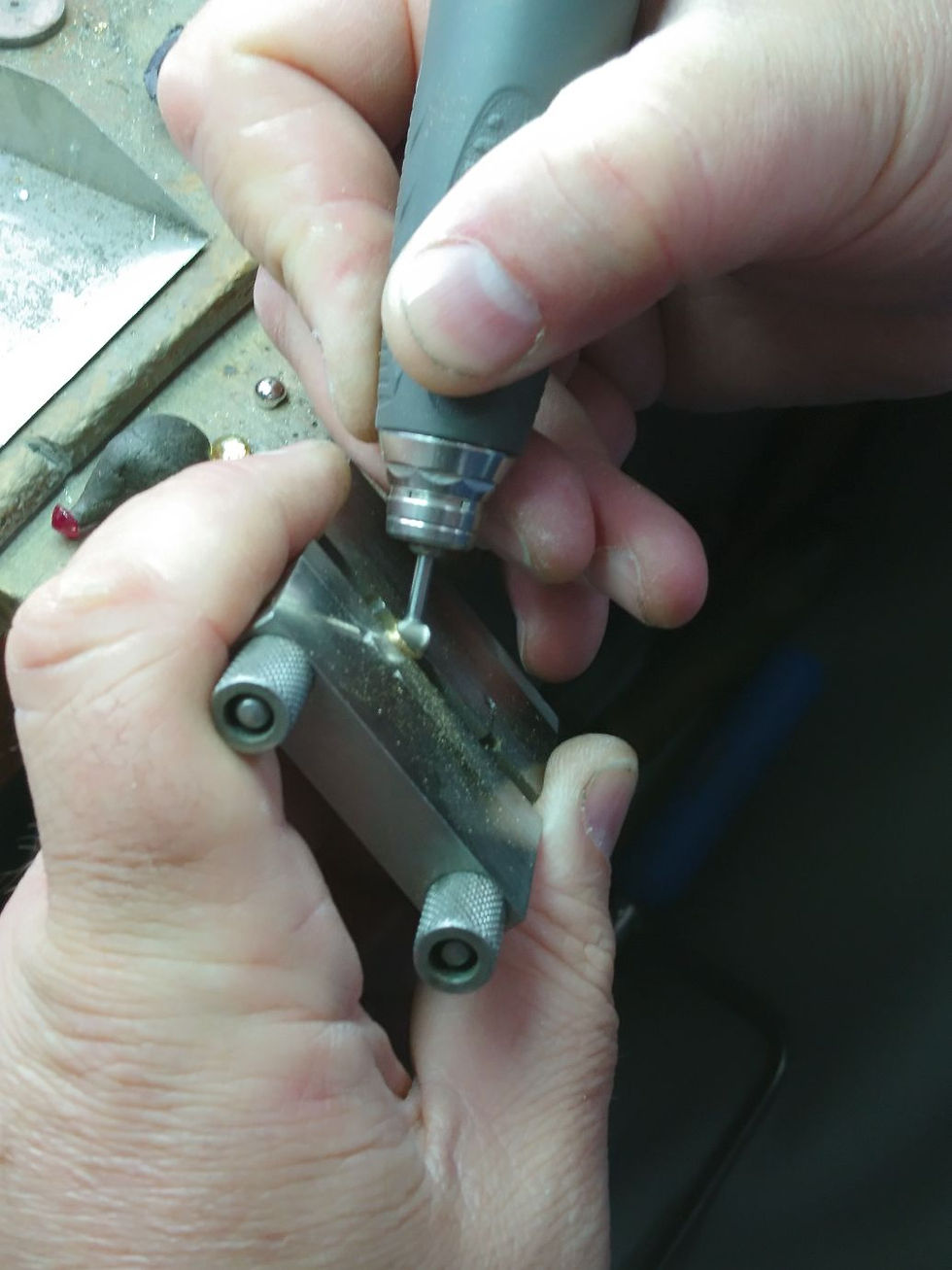 Chris drilling out a setting.