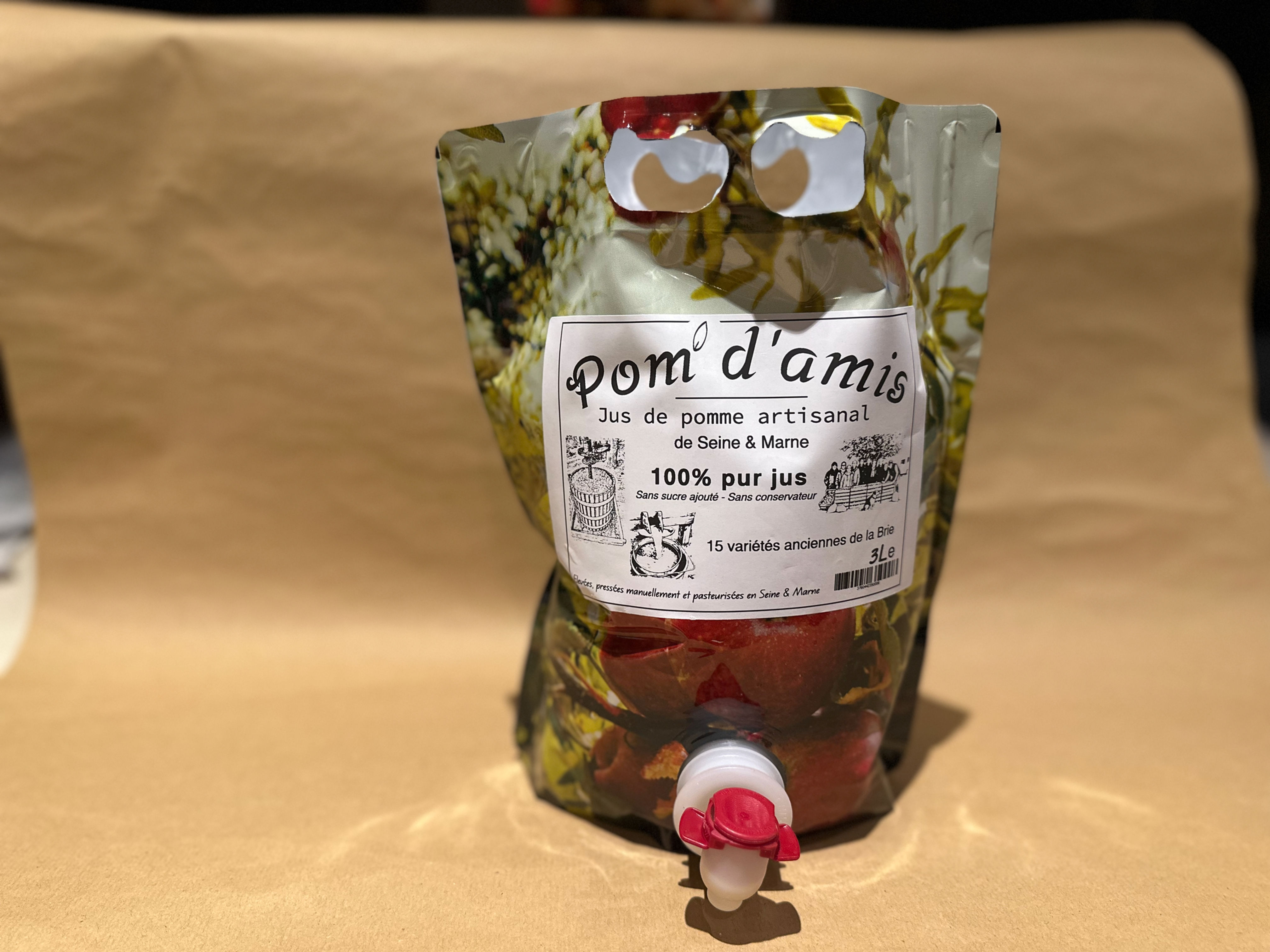 Jus de pomme pasteurisé en poche