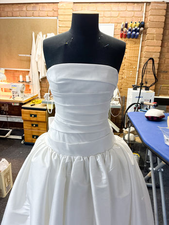 Strapless satin wedding dress after bodice and neckline alteration at Ellie Atelier Melbourne