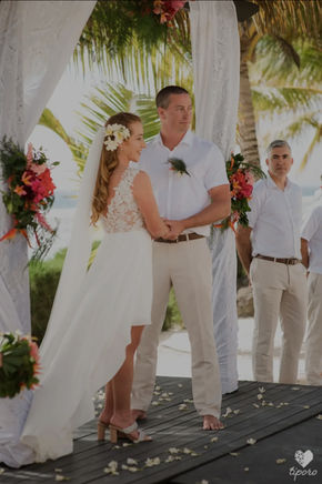 Bride in bespoke wedding dress by Ellie Atelier at a Bali beach ceremony