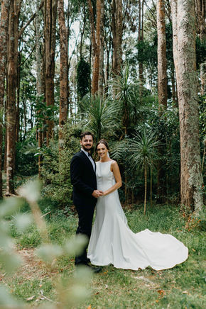 Bride in a bespoke wedding dress in a Melbourne forest.