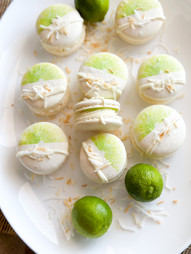 Macarons filled with lime curd and coconut swiss buttercream