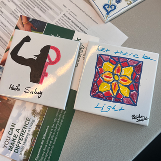 Tile painted by Haifa Subay