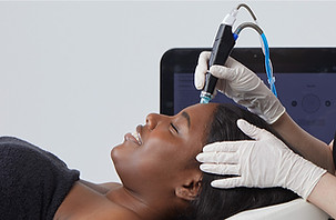 Client receiving a Hydrafacial treatment at BARENUÉ™ skincare and waxing studio in Lake Charles.