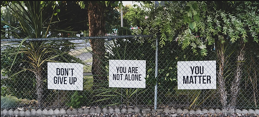 Signs, "Don't give up", "You are not alone", "You matter"