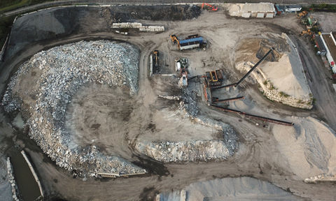 An overhead view of trucks and machinery operating at the Alsip Facility