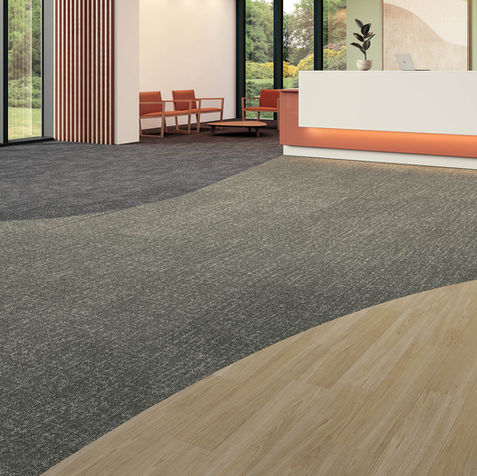 Textura de alfombra comercial color gris para oficinas